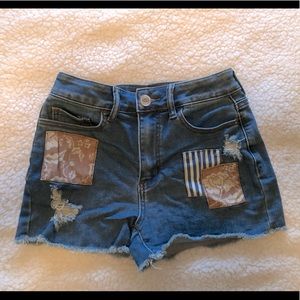 So patch work ripped jean shorts, high rise
